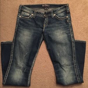 Silver Jeans. 30x33 distressed twisted jeans